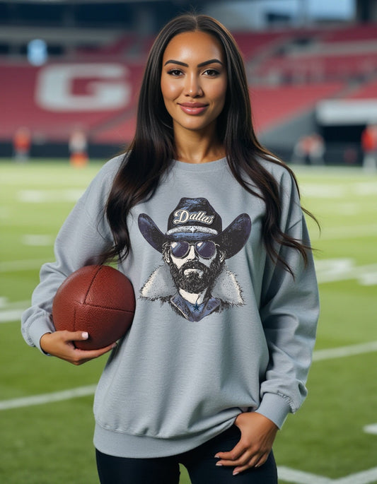 Dallas design 2 – Cowboy Spirit Animal crewneck sweatshirt modeled by a woman holding a football