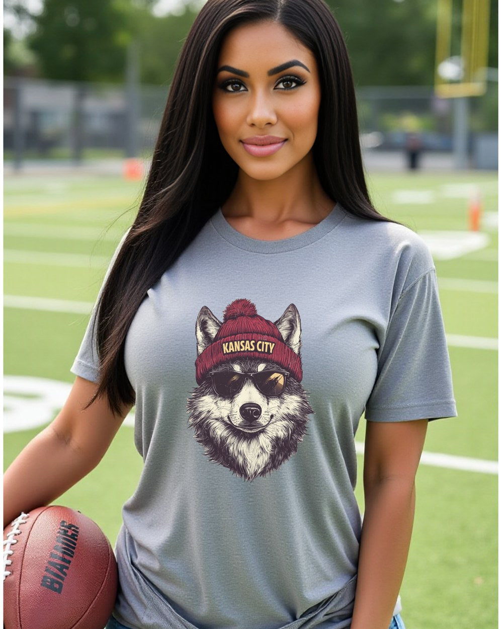 Kansas City Chiefs Spirit Animal T-shirt shown on female model with football