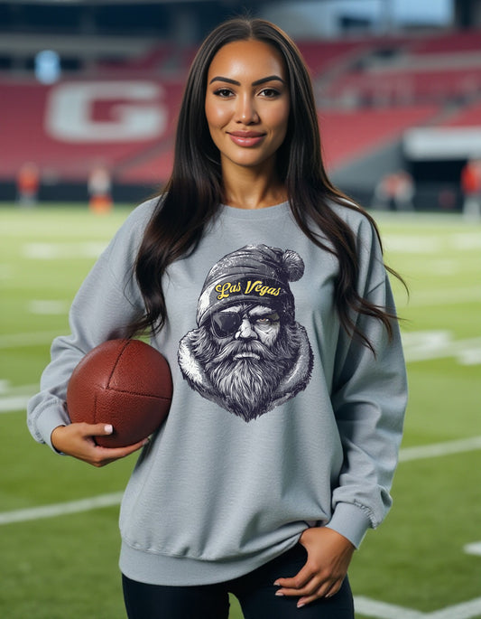 Las Vegas Raiders Spirit Animal sweatshirt on female model with football