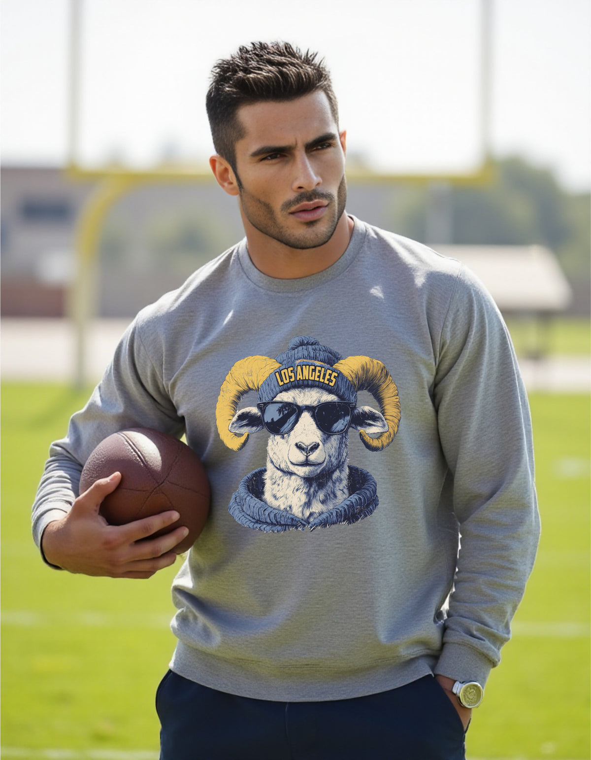 Los Angeles Rams Spirit Animal sweatshirt on male model with football