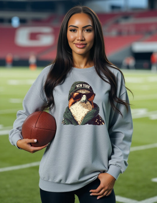 New York Jets Spirit Animal sweatshirt on female model with football