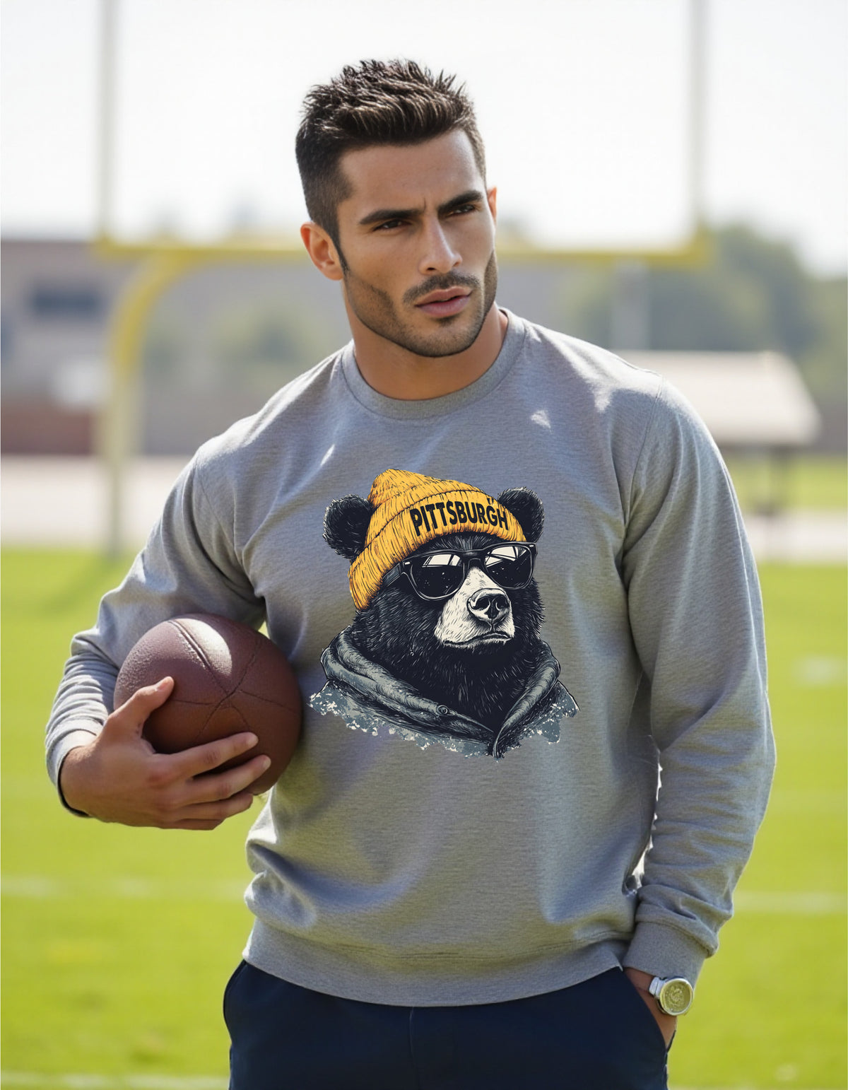 Pittsburgh Steelers Spirit Animal sweatshirt on male model with football
