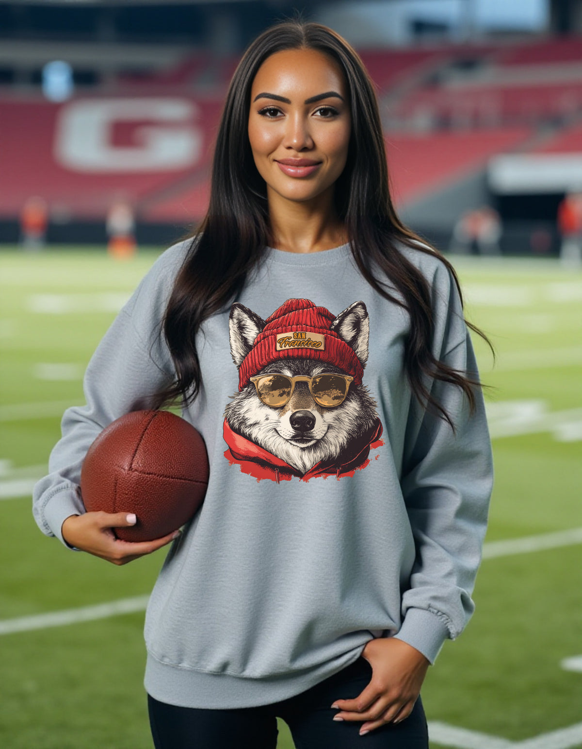San Francisco 49ers Spirit Animal sweatshirt on female model with football