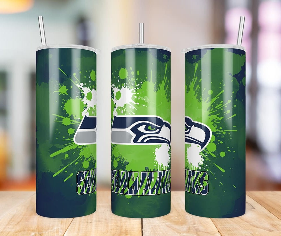 Seattle Seahawks Paint Splatter 20 oz skinny tumbler three-angle product photo