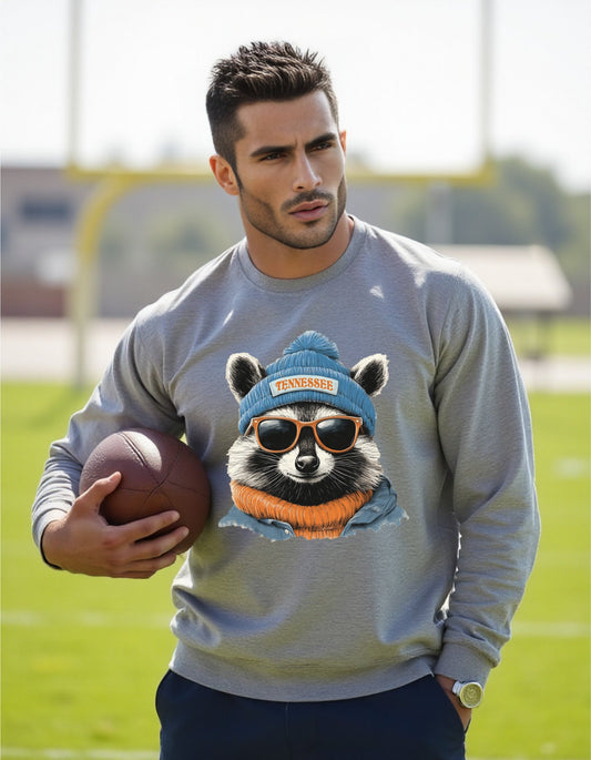 Tennessee Titans Spirit Animal sweatshirt, blue artwork, modeled by man holding a football