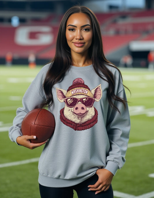 Washington Football Spirit Animal sweatshirt on female model with football