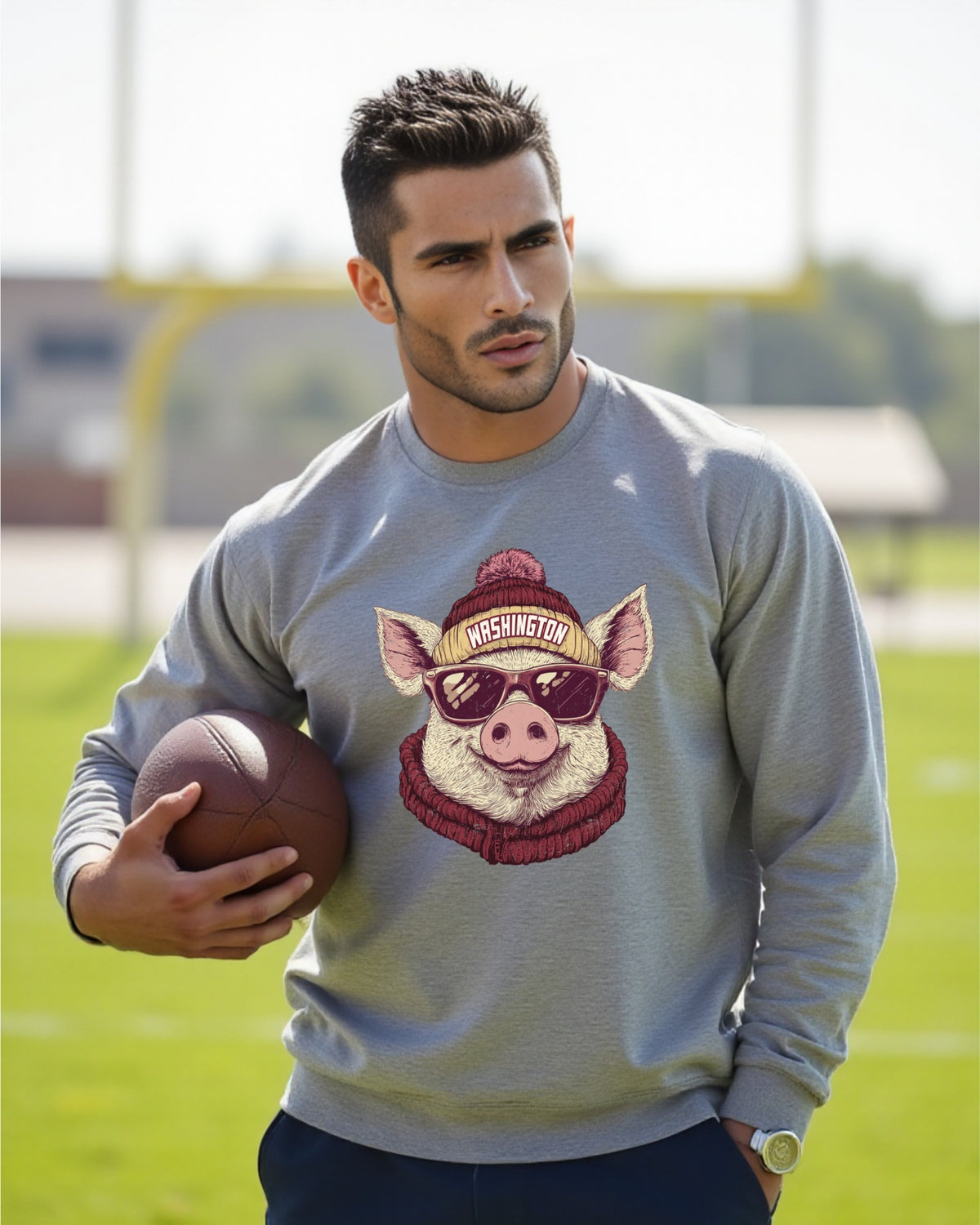 Washington Spirit Animal crewneck sweatshirt on a male model holding a football